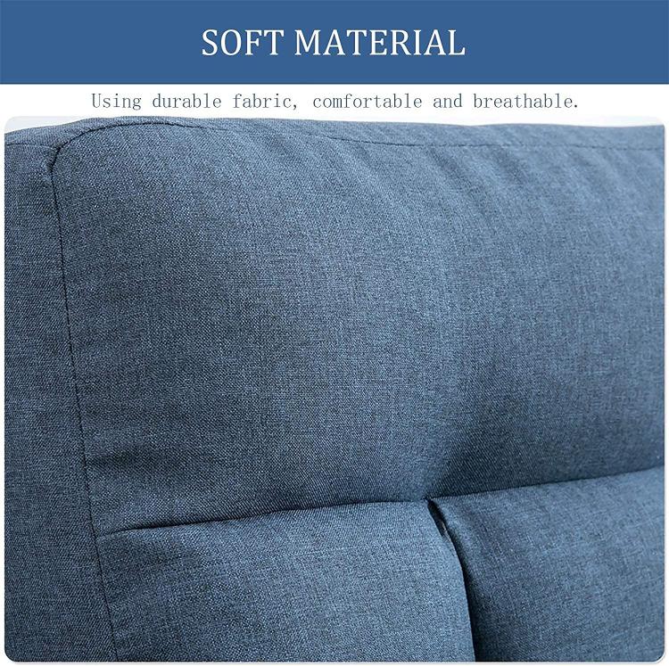 Blue upholstered fabric surface on an adjustable floor chair, showing close-up texture.