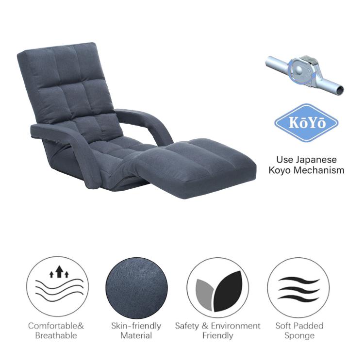 Grey padded floor gaming chair reclined with headrest and curved armrests