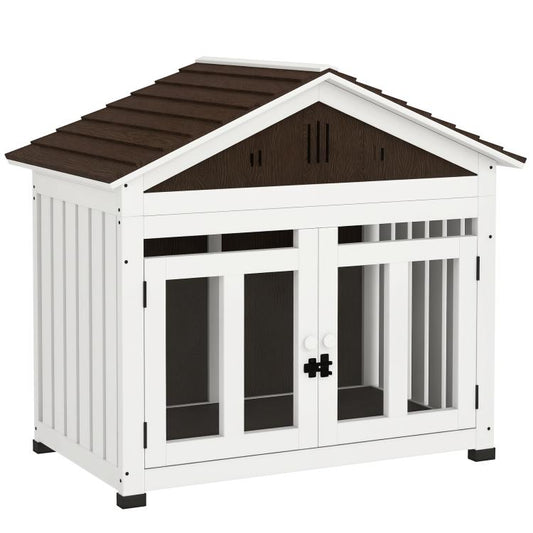 Elevated wooden dog house with dark sloped roof, white frame, front windows and vents