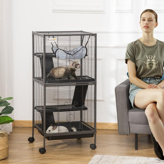Rolling small pet habitat cage with multi-level ramps, hammock, and removable tray