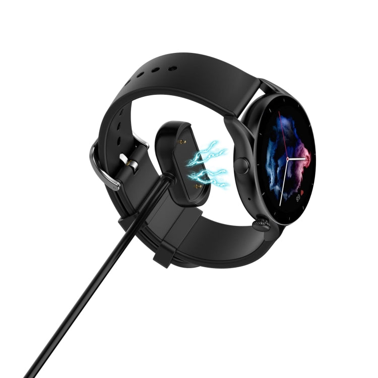 Black magnetic charging cradle cable with contact pins for a smartwatch