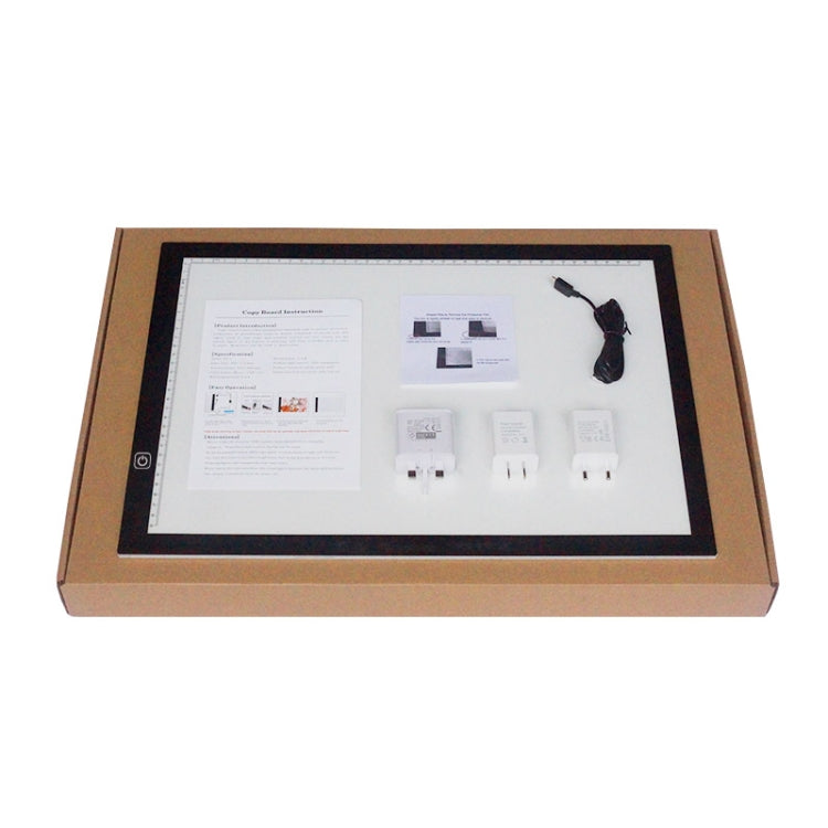 Wood-framed acrylic LED scale copy board with instruction sheets and included adapters
