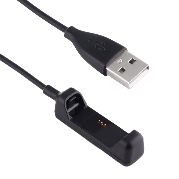Black USB charging cord close-up with metal USB-A plug and dock contact pins