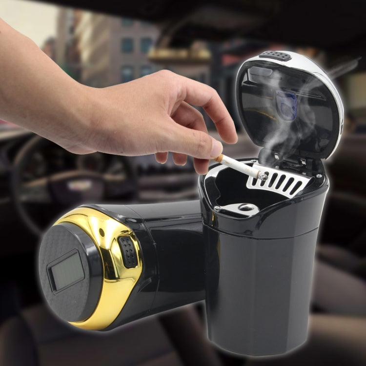Car ashtray with hinged cover, solar top light, and gold-and-black cylinder body