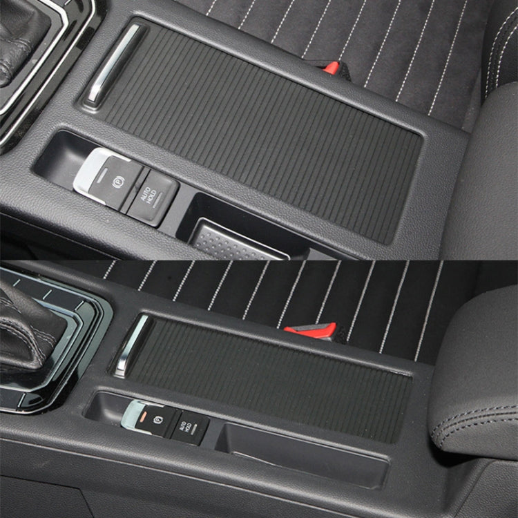 Installed black armrest box covers with silver handle, left-driving configuration