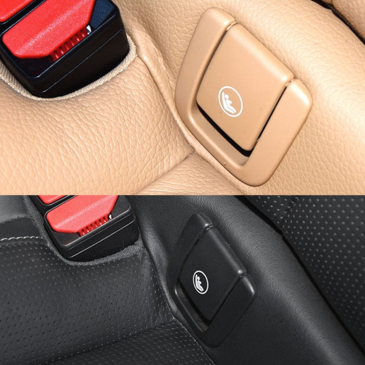 Rear child seat belt buckle cover installed, beige and black versions with icon