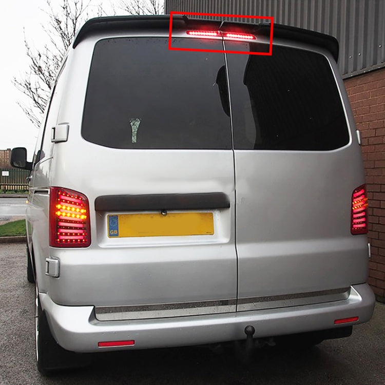 Rear van with upper center red LED brake light illuminated