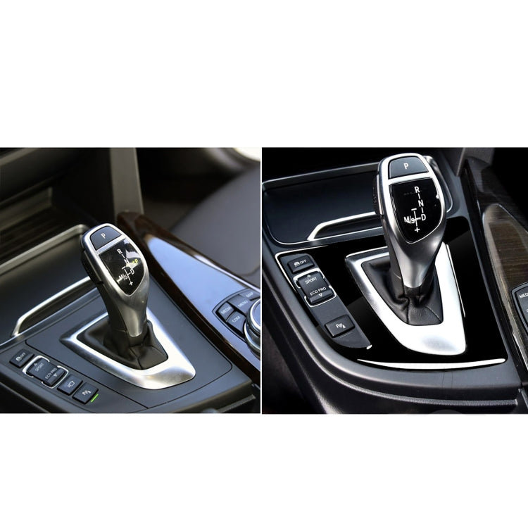 Car center console gear area showing black chrome sticker installed (before and after)