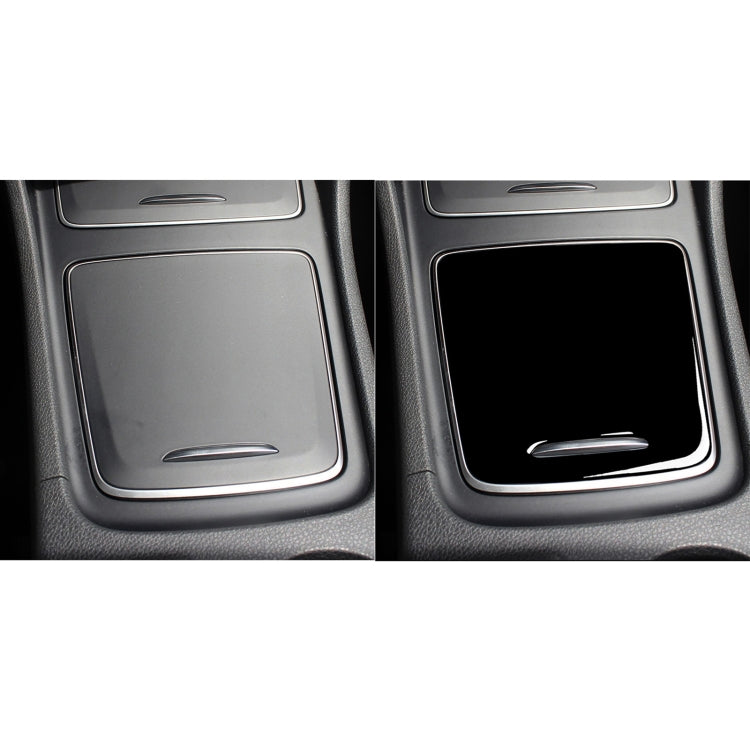 Installed black storage box cover sticker on center console panel with silver trim
