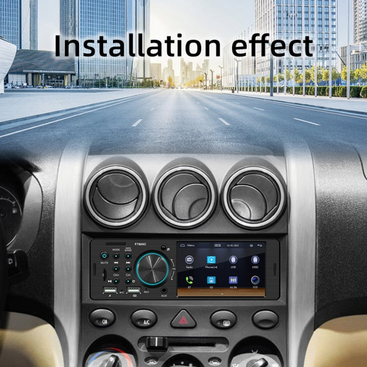 Car MP5 receiver installed in center console with LCD screen and control panel