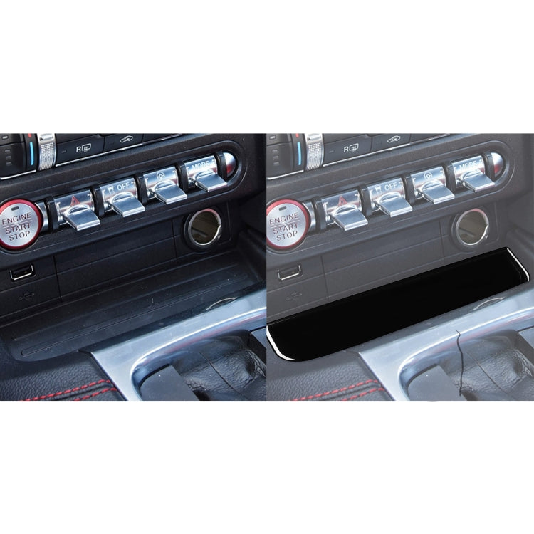 Black cup holder upper trim installed on center console with silver outline
