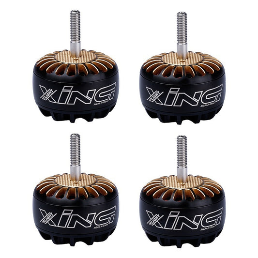 Set of 4 brushless UAV motors with black housing, gold fan, and silver threaded shaft