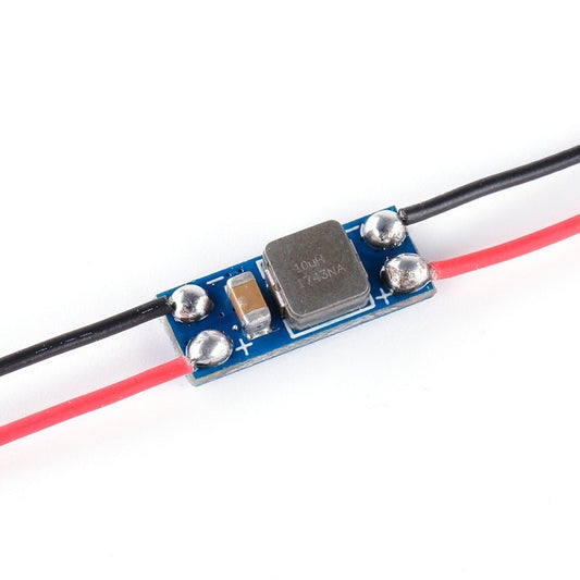 LC filter module with soldered leads, blue PCB, and IC component