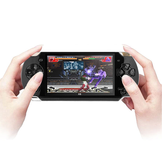 Black retro handheld game console with screen gameplay, held in hands