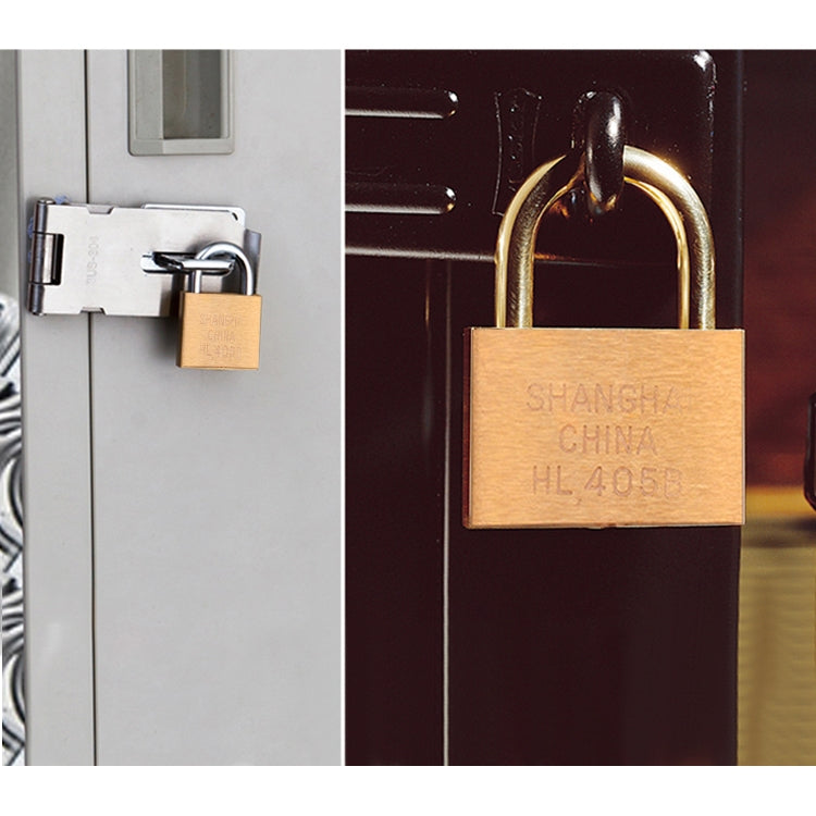 Copper padlock secured on a door latch, with lock body facing outward