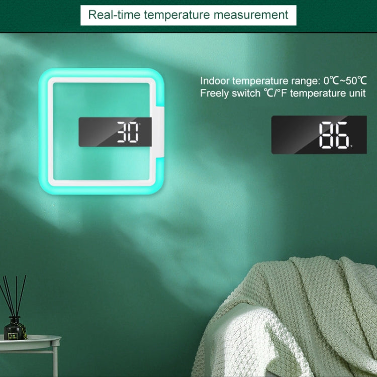 Square RGB digital alarm clock showing temperature readout 86 with cyan LED glow frame