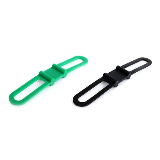 Green and black bicycle strap holders with oval loop openings for handlebar mounting