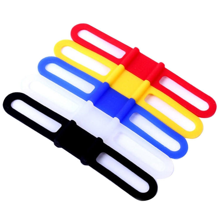 Five bicycle strap holders in red, yellow, blue, white, and black with oval loops