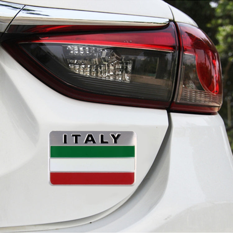 Italy shield metal car badge on car trunk with ITALY text and green-white-red panels