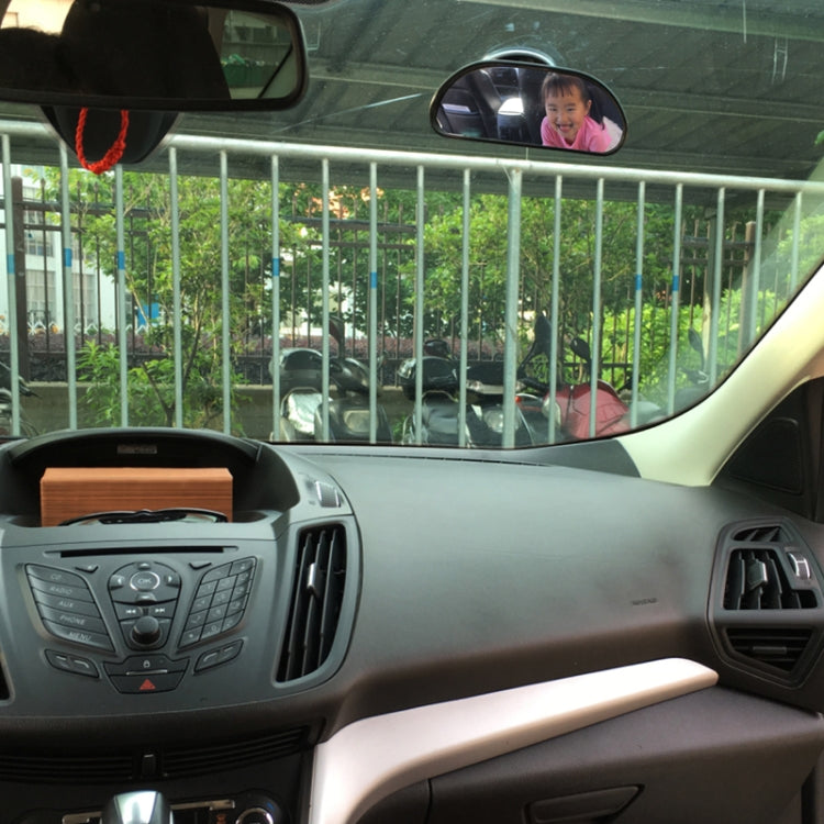 Baby car safety mirror mounted on dashboard