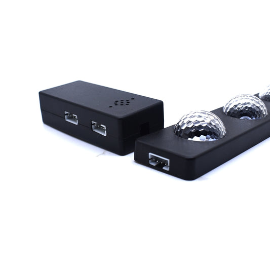 Black LED light control modules with attached disco-ball style RGB LED heads