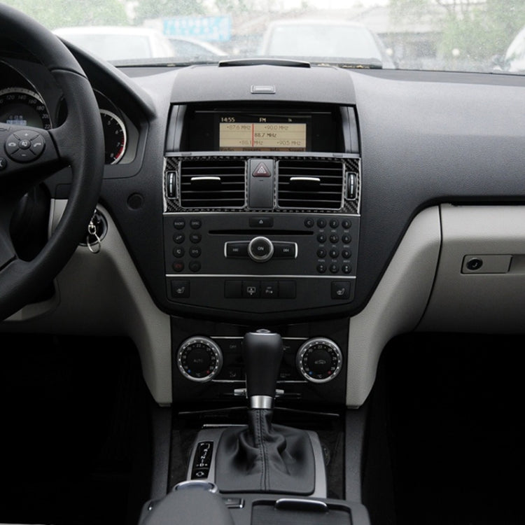 Car dashboard center air vent trim with carbon-fiber style rectangular inserts