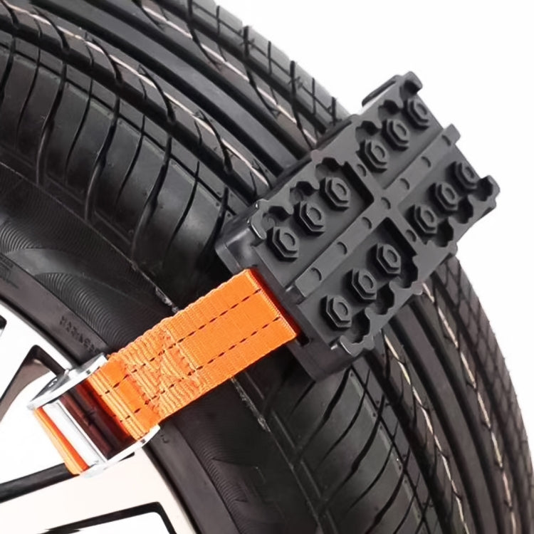 Traction grip track strapped to a tire tread for winter snow grip