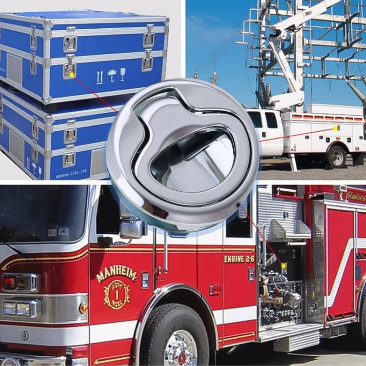Chrome circular door latch release cup mounted on a vehicle-style panel