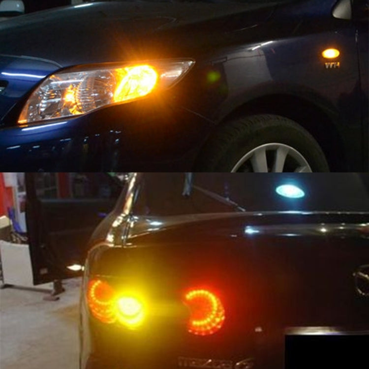 Car front with amber LED indicator and turn signals illuminated near headlamps