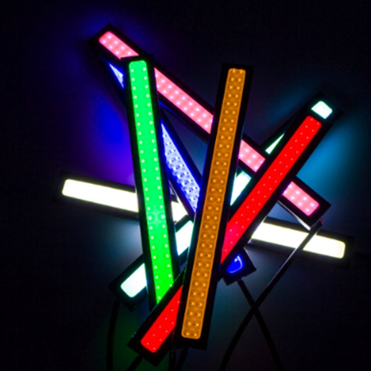 Assorted LED light bars displaying different colors with bright dotted lighting