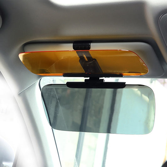 Car sun visor mirror with yellow anti-glare lens and black mounting bracket