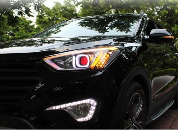 Car front headlight with amber LED turn signal and white LED light strip