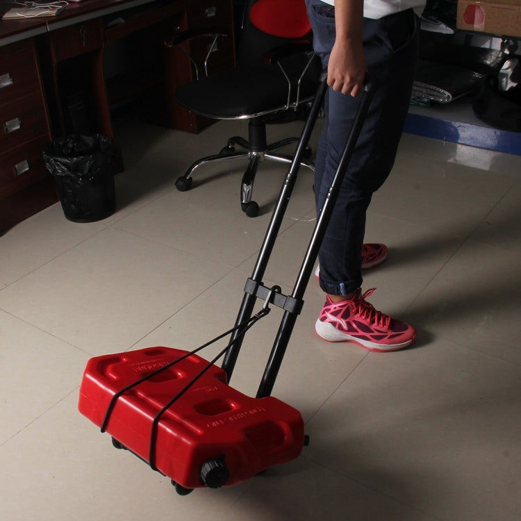 Black folding luggage cart trolley with rope handle, pulling a red suitcase