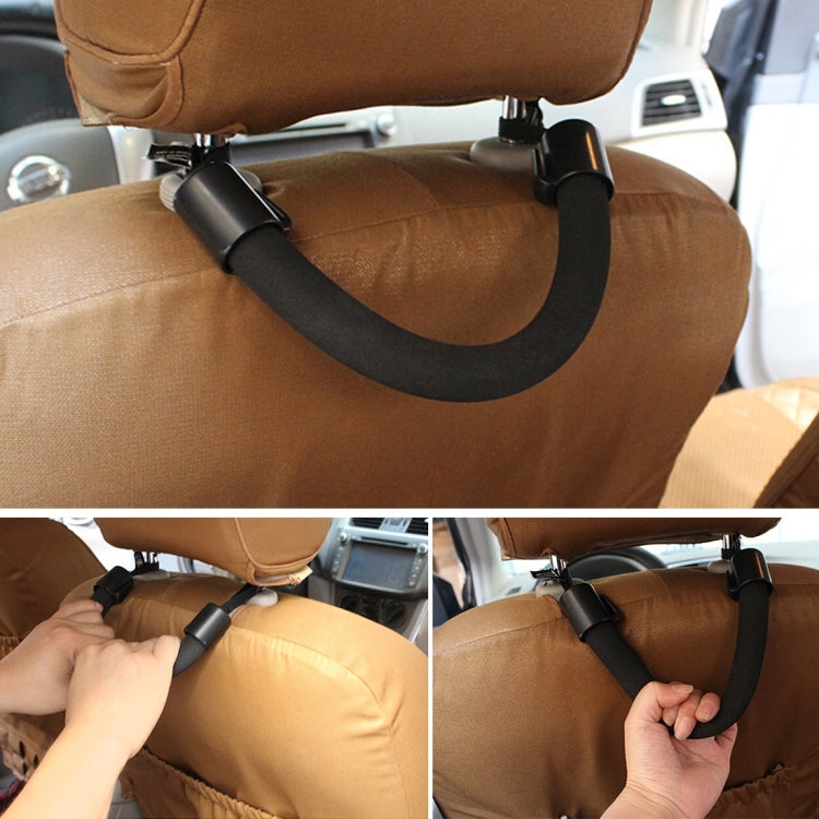 Installed black back-seat grab strap on headrest, with pull handle