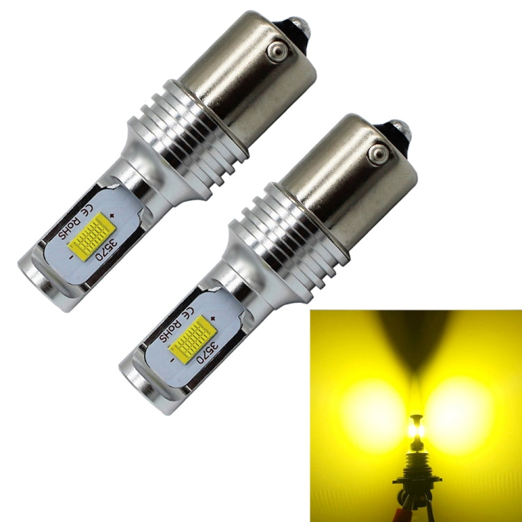 Two LED BA15S bulbs glowing yellow, silver housing with ribbed heatsink