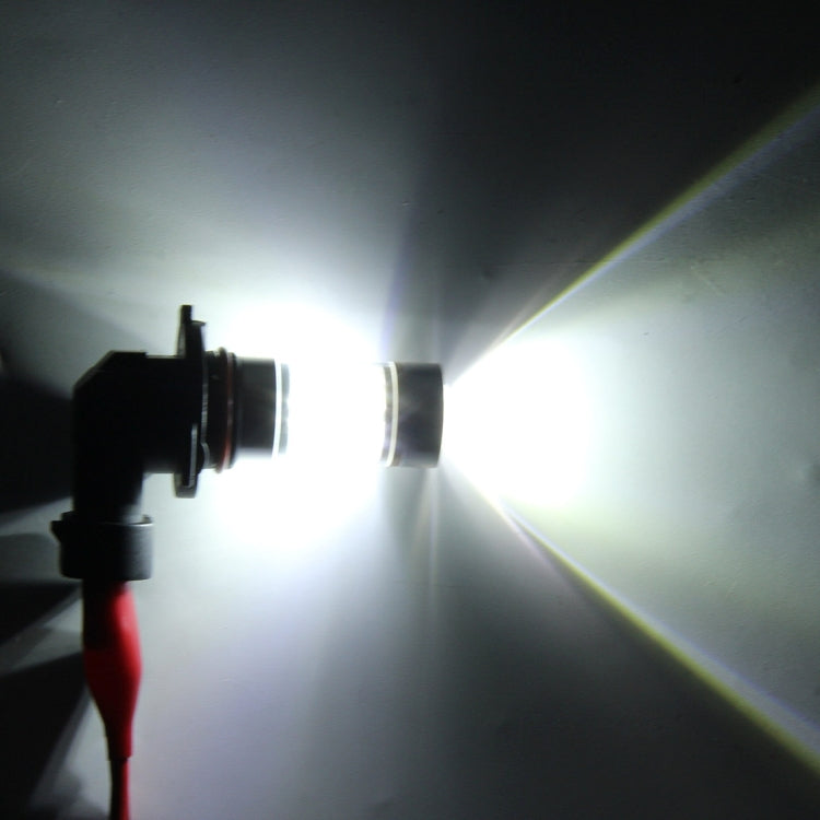 LED fog light bulb emitting a bright white beam with sharp light cut