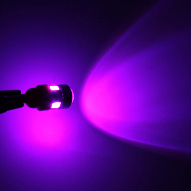 T10 LED bulb glowing pink/purple light projecting from bulb tip