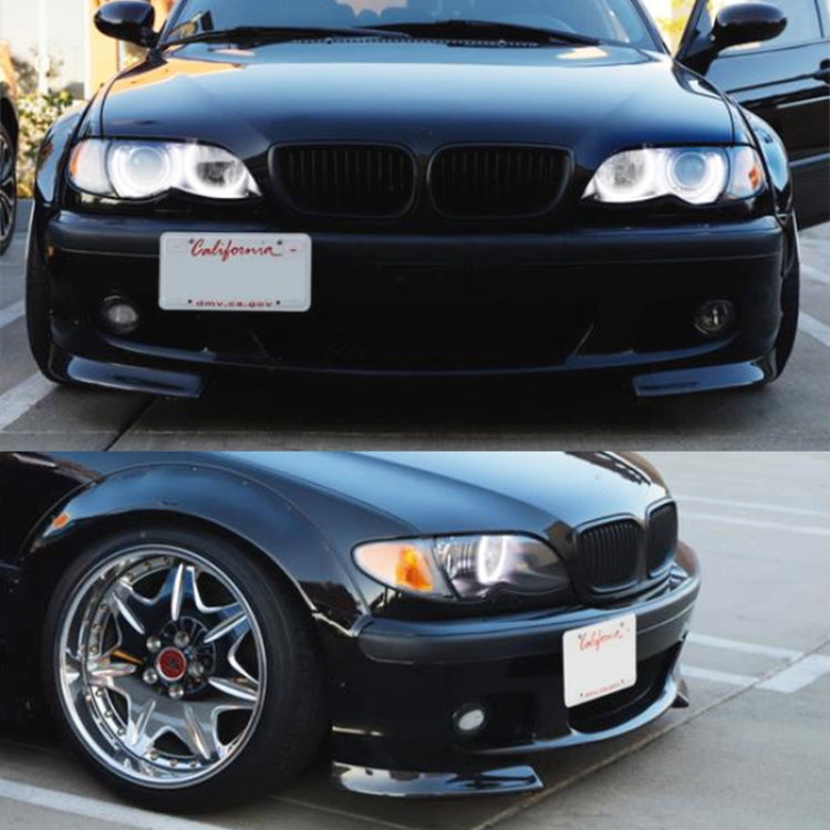 Front bumper with tow hook license plate bracket on dark car