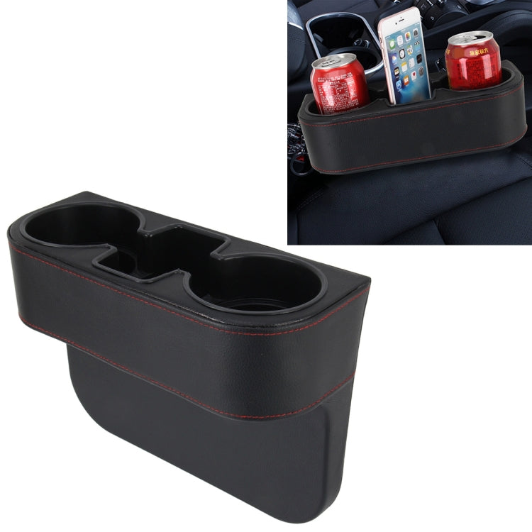 Black car seat crevice storage box with two cup holders and red-stitched trim