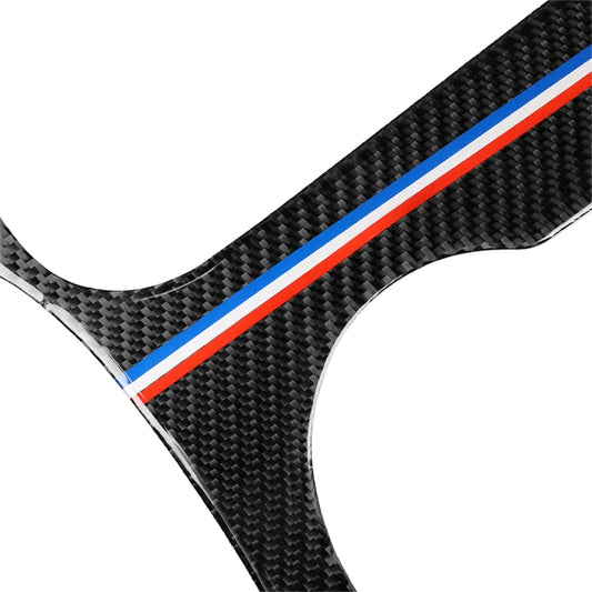Close-up carbon fiber-style sticker edge with blue and red stripe on black