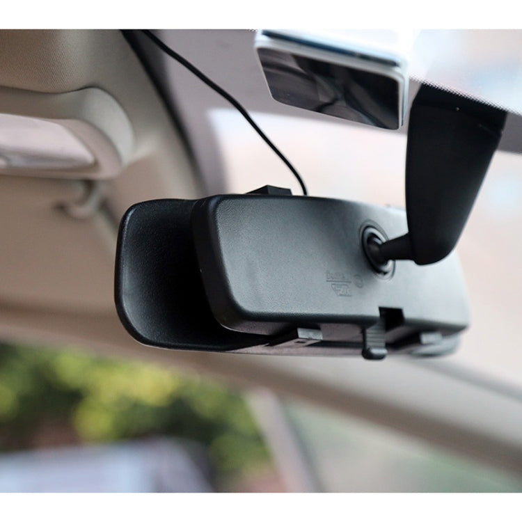 Car rearview mirror monitor installed in vehicle, black housing with power connector