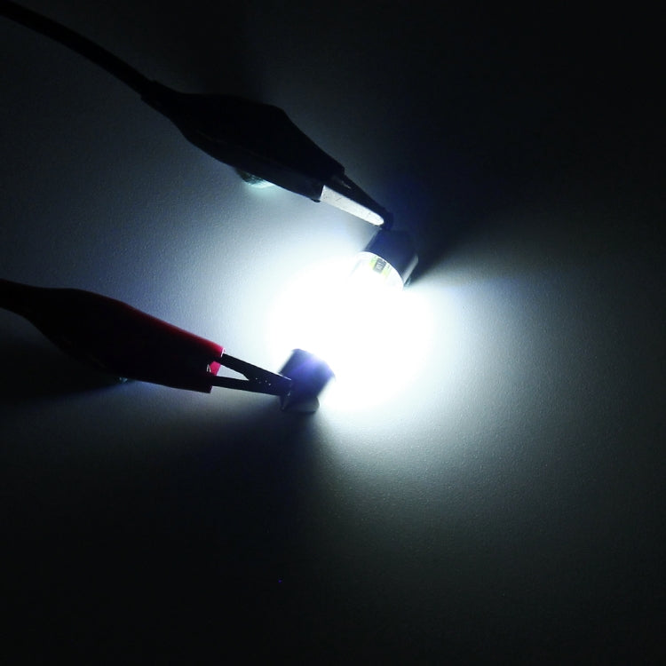 White LED glow from compact 39mm car dome light bulb