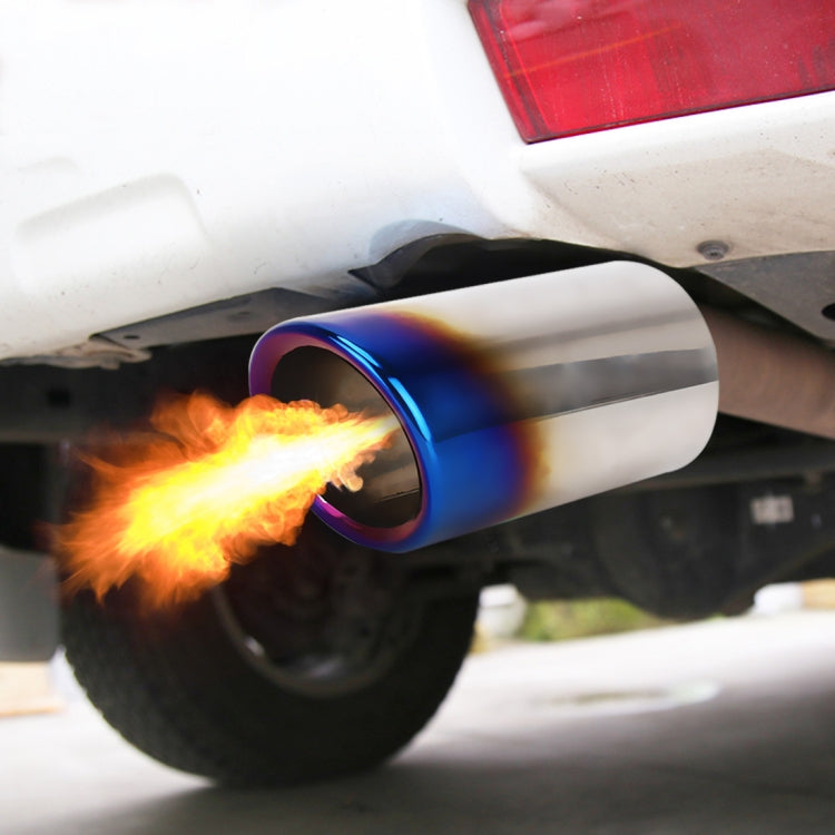 Exhaust muffler tip with blue ring, round opening, flames visible at outlet