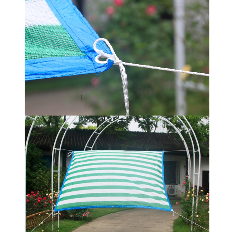 White nylon rope tied to a tent awning, multi-purpose utility cord
