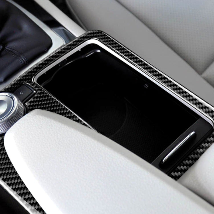 Carbon fiber center console trim insert with cutout around gear selector surround