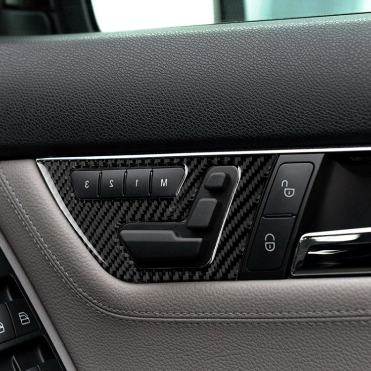 Carbon fiber-look seat adjustment panel sticker with button cutouts on car trim