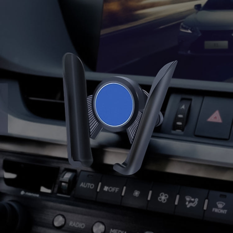 In-car vent phone mount with blue center dial on car dashboard