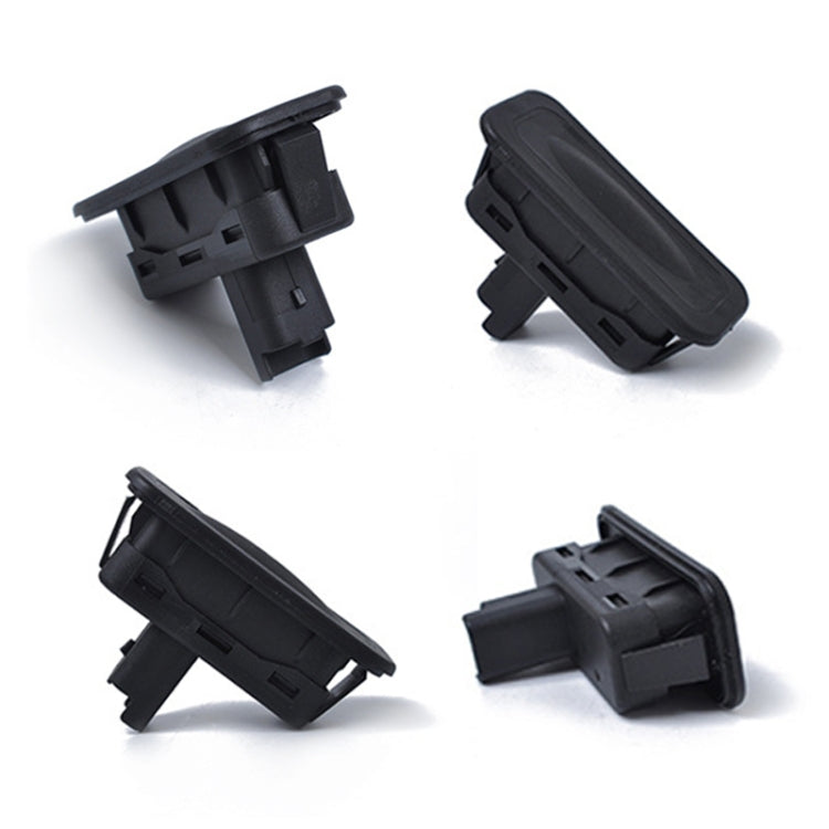 Tailgate boot release button switch shown from multiple angles with clips
