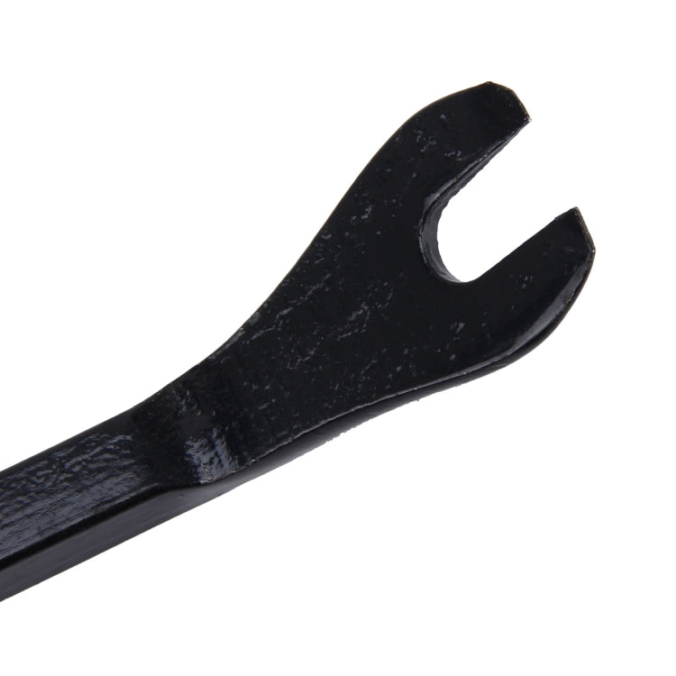 Close-up of black pry head for car trim panel clip remover tool