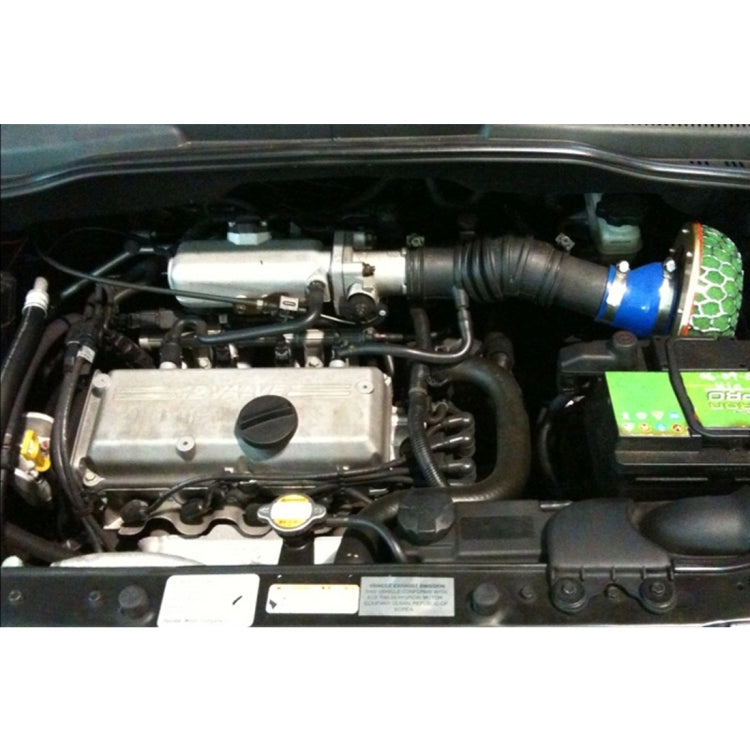 Mushroom air filter installed in car engine bay with green hex mesh top